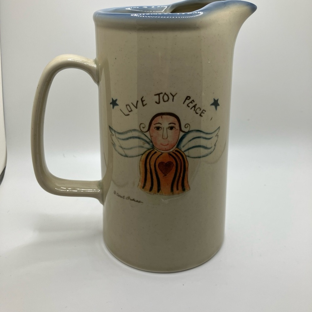 Cream Ceramic Art Pitcher with Angelic Design